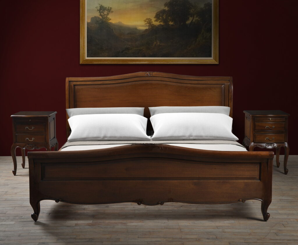 Image of a British Colonial design mahogany bedframe being sold in Home of Homes